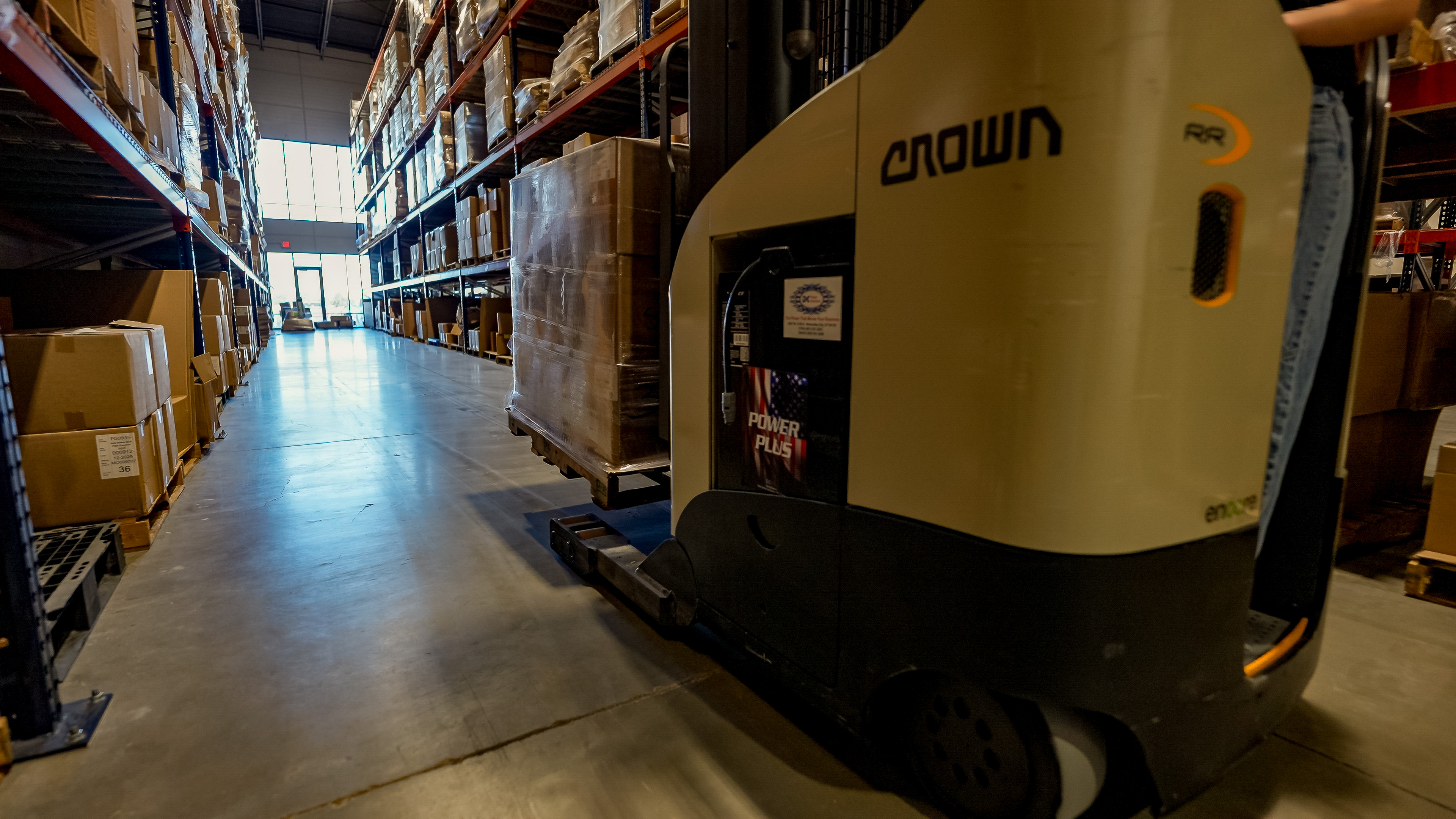 A RepFulfillment operator moving inventory in the Springville warehouse